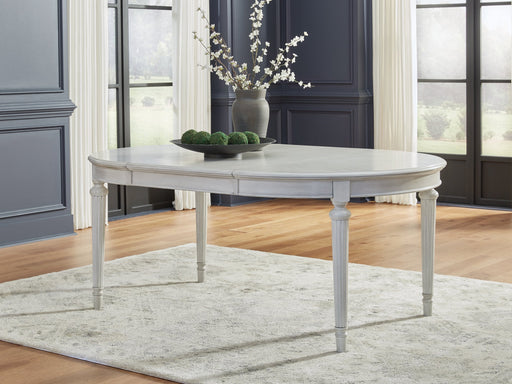 Montelaine Dining Extension Table - Plourde Furniture Co (Caribou, ME)