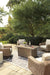 Beachcroft Beachcroft Fire Pit Table with Four Nuvella Swivel Lounge Chairs - Plourde Furniture Co (Caribou, ME)